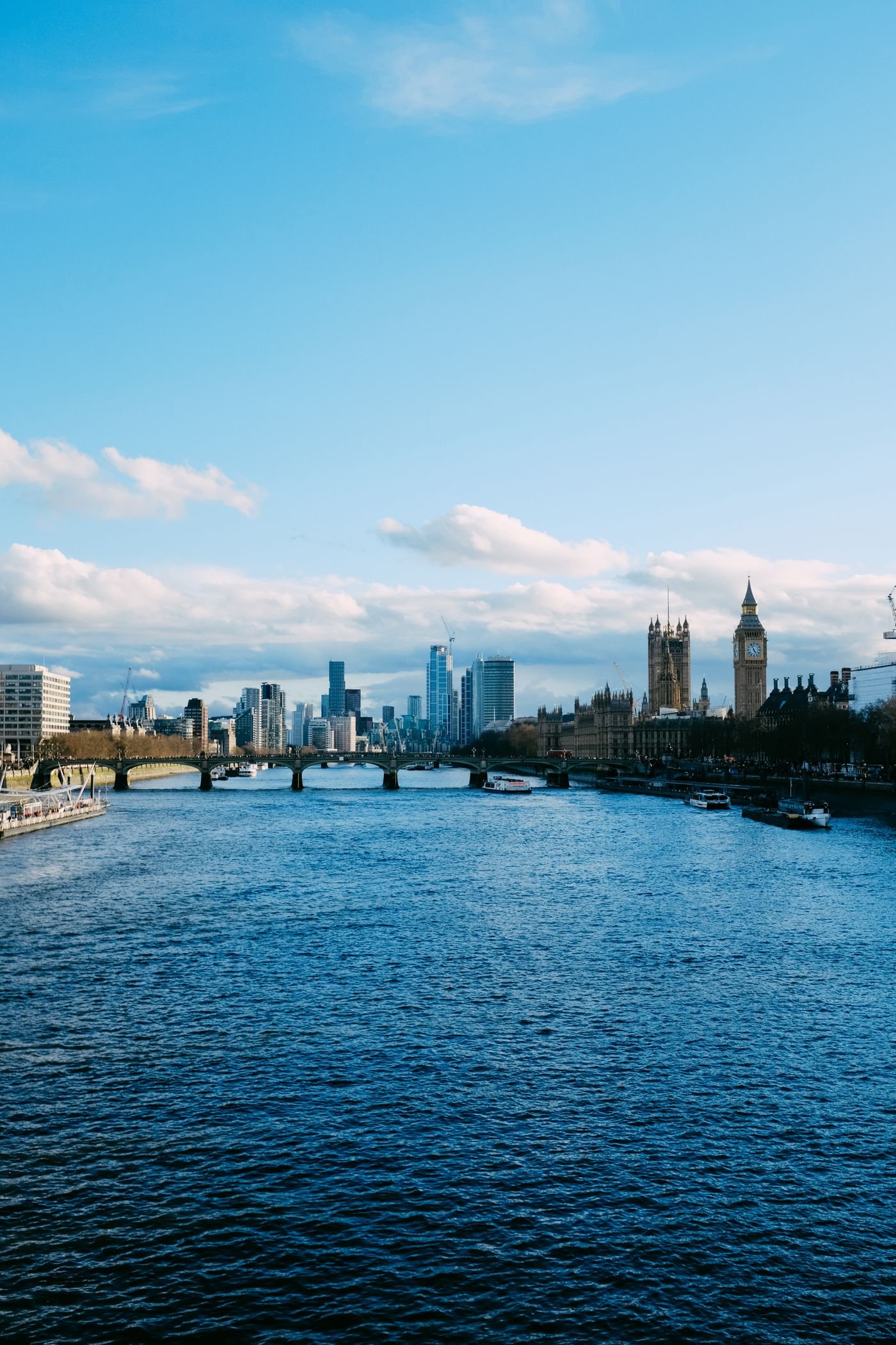 London riverside with city landmarks beside the Thames
